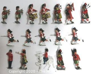 Group of Lead Metal Toy Soldiers Made by Britains of England.  Played with Condition.  Some Damage.