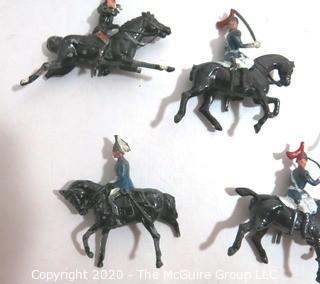 Collection of Lead Toy Soldiers made By Britains of England.  Soldiers on Horseback.  Played with Condition, Some Damage. 