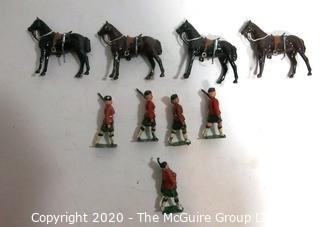 Group of Lead Metal Toy Soldiers Made by Britains of England.  Played with Condition.  Some Damage.