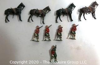 Group of Lead Metal Toy Soldiers Made by Britains of England.  Played with Condition.  Some Damage.