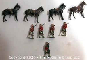 Group of Lead Metal Toy Soldiers Made by Britains of England.  Played with Condition.  Some Damage.