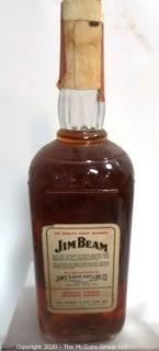 Very Old Unopened Bottle of Jim Beam Bourbon Whiskey with Tax Stamp and Four Crystal Champagne Flutes