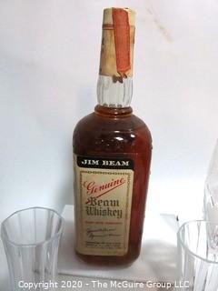 Very Old Unopened Bottle of Jim Beam Bourbon Whiskey with Tax Stamp and Four Crystal Champagne Flutes