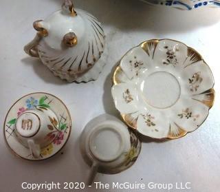 Collection of Porcelain Tea Cups and Serving Items Including Belleek.