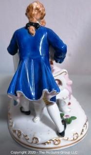 Fine Porcelain Hand Painted Figure of Couple Playing Lute.  Measures approximately 7" tall
