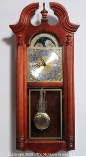 Howard Miller Fenwick Windsor Dual Chime Pendulum Wall Clock in Cherry Case.