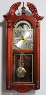 Howard Miller Fenwick Windsor Dual Chime Pendulum Wall Clock in Cherry Case.