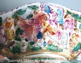 Vintage Porcelain Hand Painted Italian Capodimonte Centerpiece Covered Dish with Lid and Handles with Frolicking Figurals & Cherubs.  Measures approximately 22" long and 16"tall with lid. 
