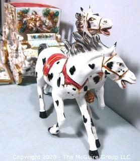 Vintage Porcelain Hand Painted Italian Capodimonte Horse & Carriage with Lidded Container.  Horses have a repair and one missing foot.  Measures approximately 14" tall with lid and 30" long. 
