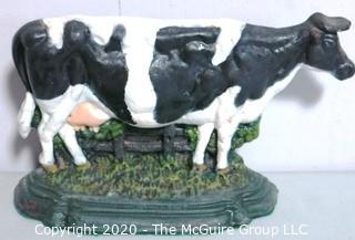 Heavy Cast Iron Painted Cow Door Stop.  Measures 9" x 14".