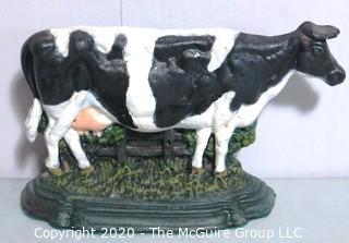 Heavy Cast Iron Painted Cow Door Stop.  Measures 9" x 14".