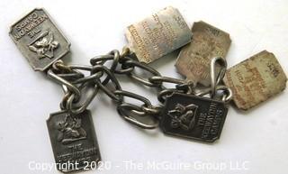 Vintage Keewaydin Camp Charm Bracelet  with Badges or Awards.  Measures approx 7" long.  Missing Clasp.