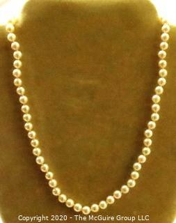 Cultured Knotted Pearls with 14kt Gold Clasp.  Measure Approx 17" long and 3mm in Diameter. 