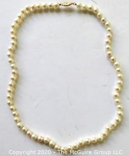 Cultured Knotted Pearls with 14kt Gold Clasp.  Measure Approx 17" long and 3mm in Diameter. 