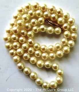 Cultured Knotted Pearls with 14kt Gold Clasp.  Measure Approx 17" long and 3mm in Diameter. 