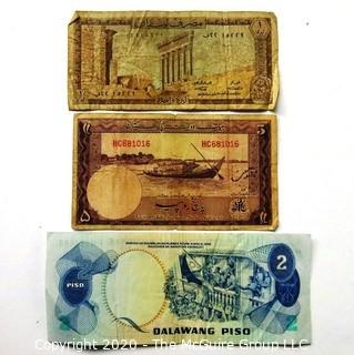 Three Vintage Bank Notes or Currency From Libya, Pakistan & Phillipines