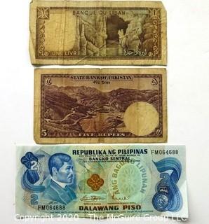 Three Vintage Bank Notes or Currency From Libya, Pakistan & Phillipines