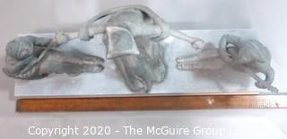 Heavy Bronze or Lead Sculpture.  Made in France and mounted to marble base.  Measures approximately 14" x 10".