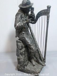 Cast Metal Statue of Boy Playing Harp.  With Repair. Measures Approx 21" x 7"