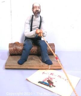 Hand Made Folk Art Craft of Man Fishing on Log, Soft Sculpture