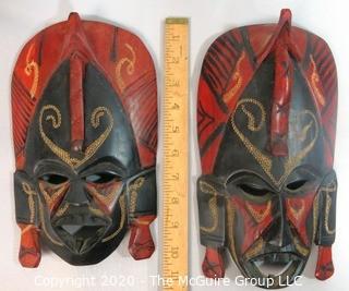 Set of Two Hand Painted & Carved African Masks.  Measure approx 11" x 6