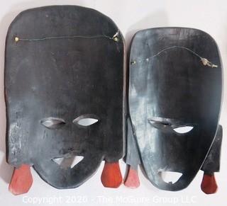 Set of Two Hand Painted & Carved African Masks.  Measure approx 11" x 6