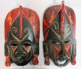 Set of Two Hand Painted & Carved African Masks.  Measure approx 11" x 6