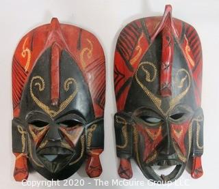 Set of Two Hand Painted & Carved African Masks.  Measure approx 11" x 6