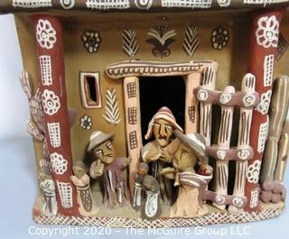 Large Ayacucho Peruvian Ceramic Folk Art Story Building with People. Measures approximately 22" x 13" x 7"