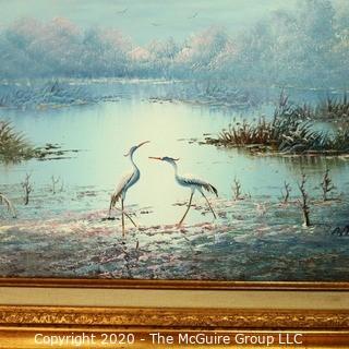 Gilt Framed Oil on Canvas Painting of Herons on Water Signed by Artist and Measures approximately 32" x 28" with Frame