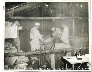 WWII 1943 Black & White Photograph of Surgery in Field Hospital in Bougninville France.  Measures approximately 8" x 10".