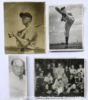 Four Vintage Black & White Photos of Baseball Players. Measure approximately 8" x 10".