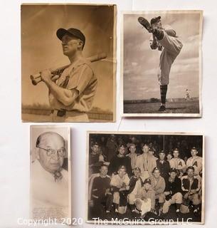 Four Vintage Black & White Photos of Baseball Players. Measure approximately 8" x 10".