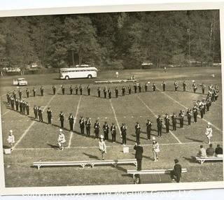 Two Black & White Photographs of Football Game and Bonfire.  Measures approximately 8" x 11".