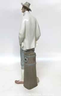 Lladro Porcelain Figurine of Man at Pier.  Small Chip in Hat.