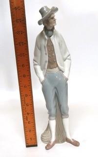 Lladro Porcelain Figurine of Man at Pier.  Small Chip in Hat.