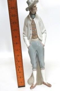 Lladro Porcelain Figurine of Man at Pier.  Small Chip in Hat.