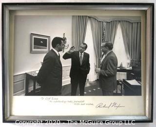 Framed Black & White Photo of Clifford Evans Meeting with President Richard Nixon in the Oval Office, Signed. Third person is Press Secretary Ron Zeigler. Measures approximately 12" x 15".  US Presidential Memorabilia