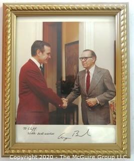 Framed Color Photo of Clifford Evans Conversing with George H W Bush; signed.   Measures approximately 11" x 9".   US Presidential Political Memorabilia