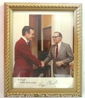 Framed Color Photo of Clifford Evans Conversing with George H W Bush; signed.   Measures approximately 11" x 9".   US Presidential Political Memorabilia