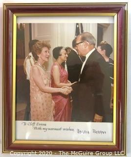 Framed Color Photo of Clifford Evans Greeting the First Lady at Reagan White House reception for Indira Ghandi; signed.    Measures approximately 10" x 15".  US Presidential Political Memorabilia