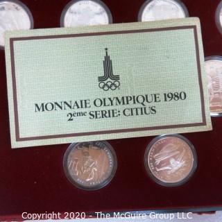 90% Solid Silver Official 1980 Moscow Olympic Coin Issue Series II Citius, in red presentation box. There are (5) 10 rouble coins and (7) 5 rouble coins

Combined weight 284 grams

Note: Presentation box is damaged
 