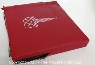 90% Solid Silver Official 1980 Moscow Olympic Coin Issue Series II Citius, in red presentation box. There are (5) 10 rouble coins and (7) 5 rouble coins

Combined weight 284 grams

Note: Presentation box is damaged
 