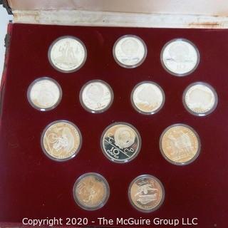 90% Solid Silver Official 1980 Moscow Olympic Coin Issue Series II Citius, in red presentation box. There are (5) 10 rouble coins and (7) 5 rouble coins

Combined weight 284 grams

Note: Presentation box is damaged
 