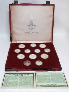 90% Solid Silver Official 1980 Moscow Olympic Coin Issue Series II Citius, in red presentation box. There are (5) 10 rouble coins and (7) 5 rouble coins

Combined weight 284 grams

Note: Presentation box is damaged
 