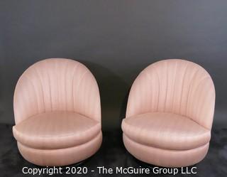 Pair of Channel Back Upholstered Swivel Tilt Chairs of the Art Deco Style; made by Thayer Coggin, Inc. 1986. 30W x 31.5T x 22.5D 