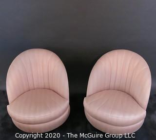 Pair of Channel Back Upholstered Swivel Tilt Chairs of the Art Deco Style; made by Thayer Coggin, Inc. 1986. 30W x 31.5T x 22.5D 