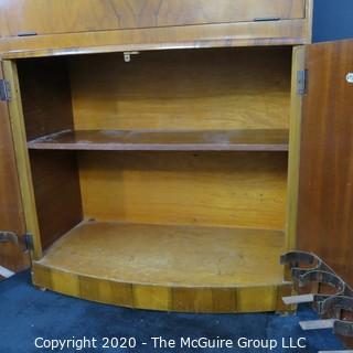 1930's Art Deco: Rivington Cabinet Works (London) Mid Century Dry Bar with Lighted Fold down door and mirrored panels with accessories.  Measures approximately 42"W 31"T 15"D. Vintage Furniture