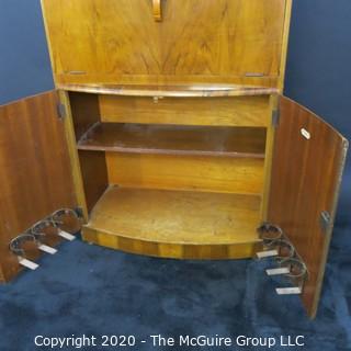 1930's Art Deco: Rivington Cabinet Works (London) Mid Century Dry Bar with Lighted Fold down door and mirrored panels with accessories.  Measures approximately 42"W 31"T 15"D. Vintage Furniture