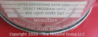 Wurlitzer Jukebox, 1954 Model F-1700, restored with manual and 45 rpm records.  In addition, (2) Matching Art Deco Vintage Wurlitzer Model 5205 Remote Wall Box Table Top Jukeboxes; 12 x 12 7.5"D32"W x 28"D x 56"T